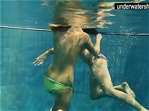 two wonderful amateurs displaying their bodies off under water